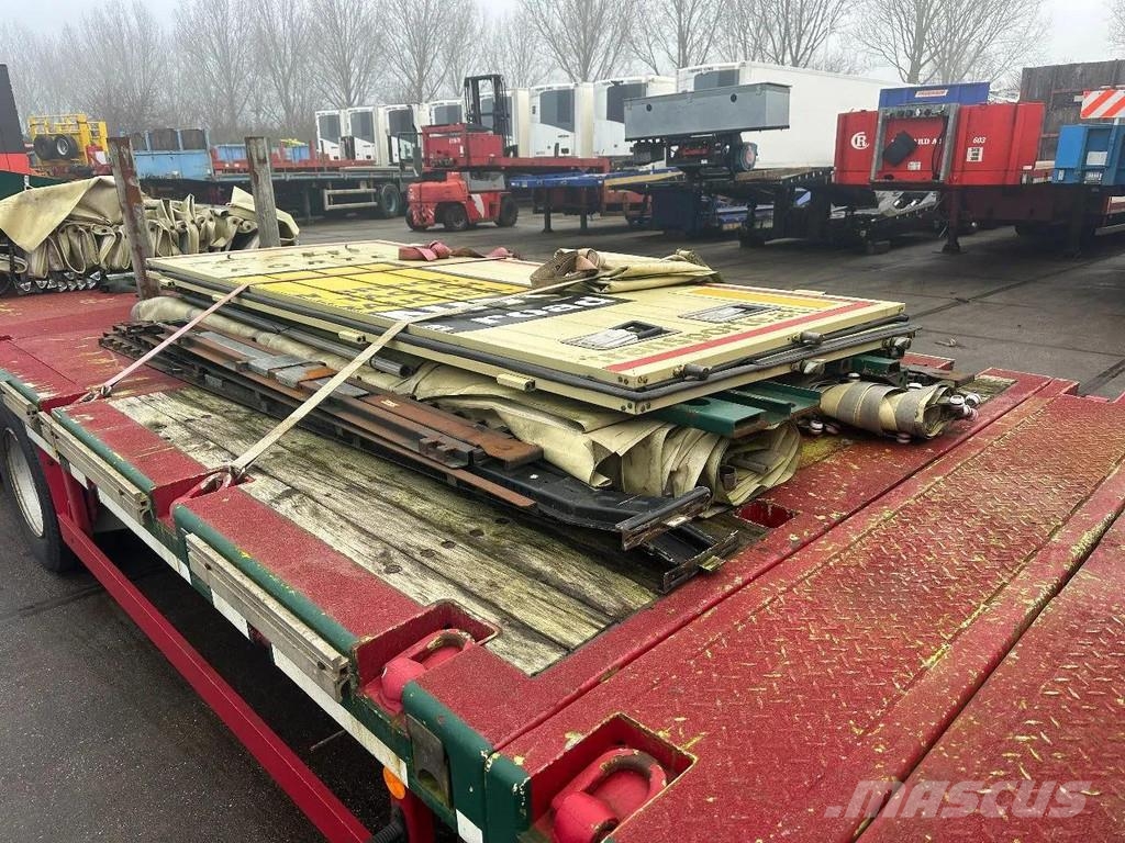 Meusburger 4 AXLE STEERING - DOUBLE EXTENDABLE UP TO 28 M - E نصف مقطورة مسطحة منخفضة