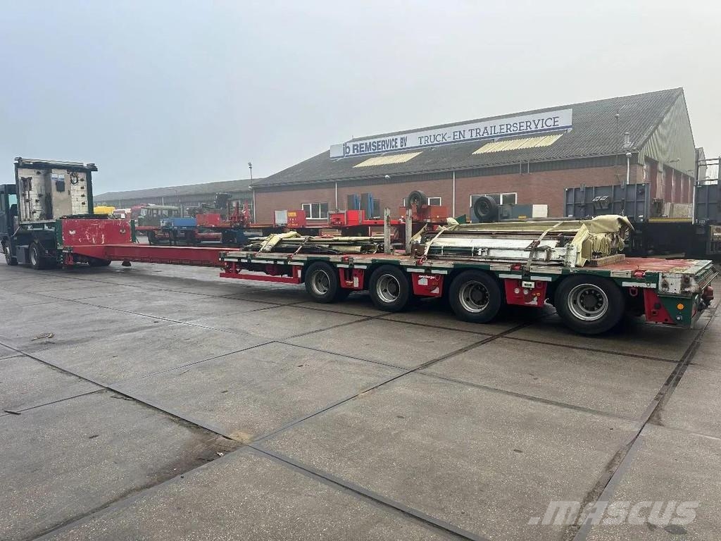Meusburger 4 AXLE STEERING - DOUBLE EXTENDABLE UP TO 28 M - E نصف مقطورة مسطحة منخفضة