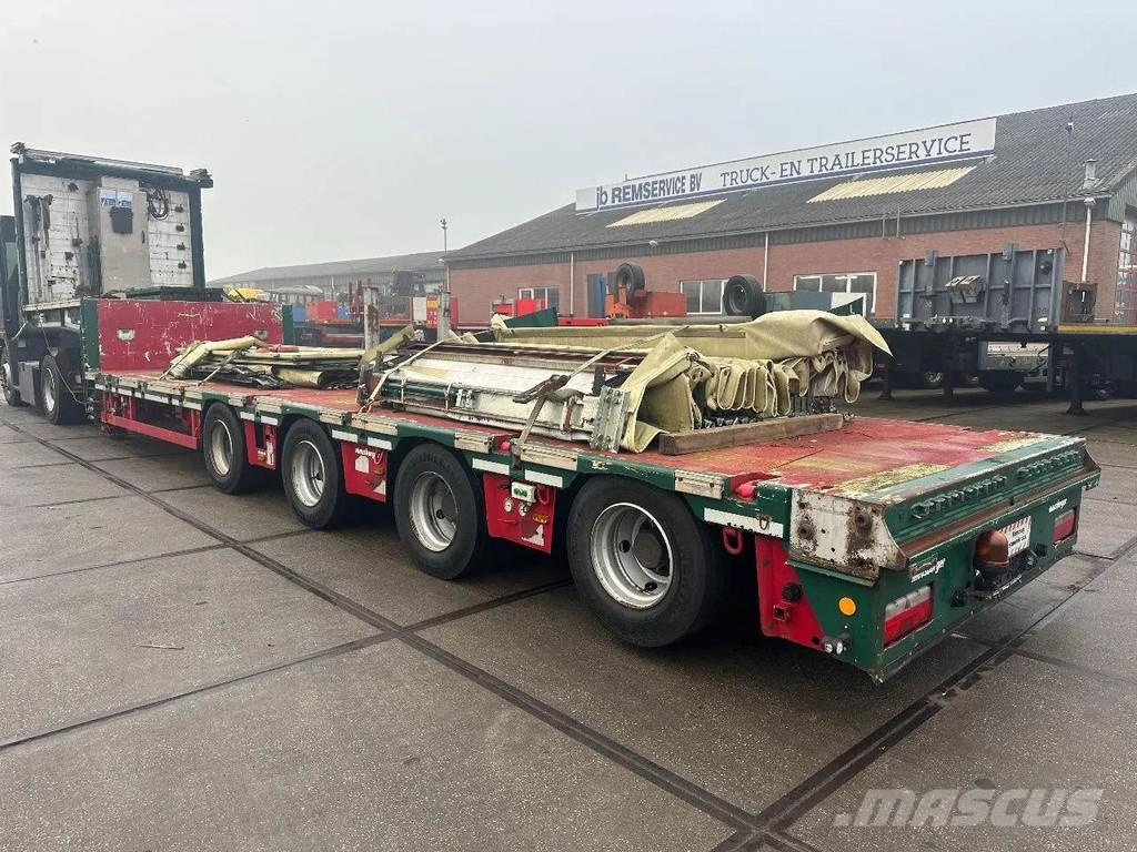 Meusburger 4 AXLE STEERING - DOUBLE EXTENDABLE UP TO 28 M - E نصف مقطورة مسطحة منخفضة