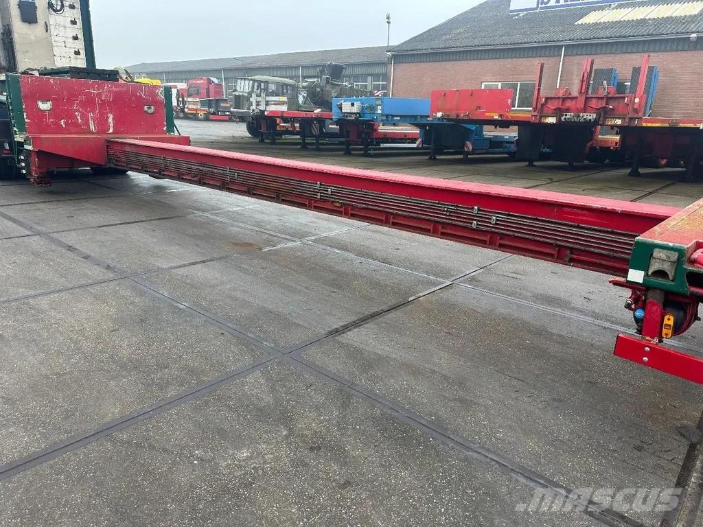Meusburger 4 AXLE STEERING - DOUBLE EXTENDABLE UP TO 28 M - E نصف مقطورة مسطحة منخفضة