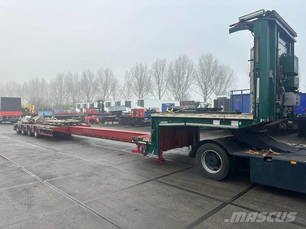 Meusburger 4 AXLE STEERING - DOUBLE EXTENDABLE UP TO 28 M - E نصف مقطورة مسطحة منخفضة