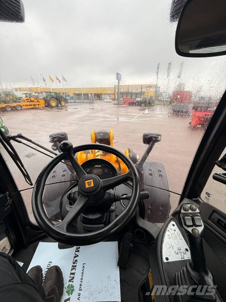 JCB 409 Iekrāvēji uz riteņiem