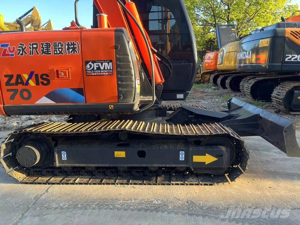 Hitachi ZX70 Гусеничні екскаватори