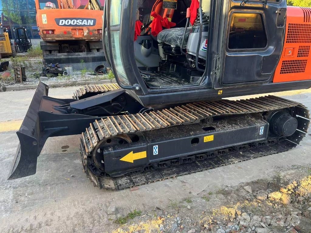 Hitachi ZX70 Гусеничні екскаватори