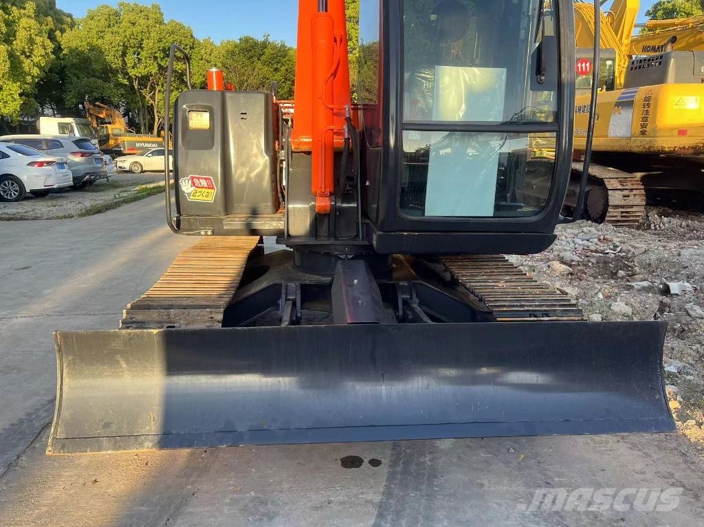 Hitachi ZX70 Гусеничні екскаватори