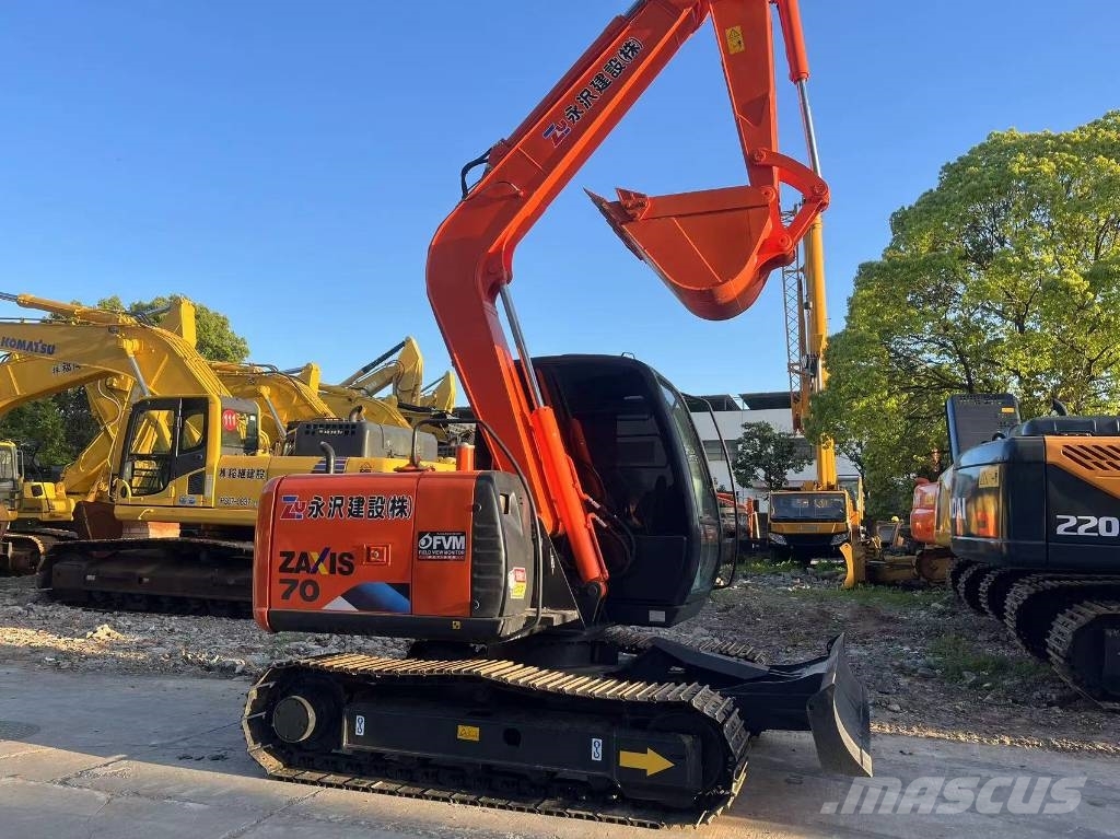 Hitachi ZX70 Гусеничні екскаватори