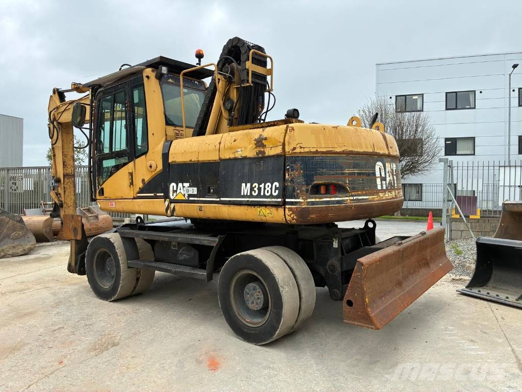 CAT M 318 C Εκσκαφείς με τροχούς - λάστιχα
