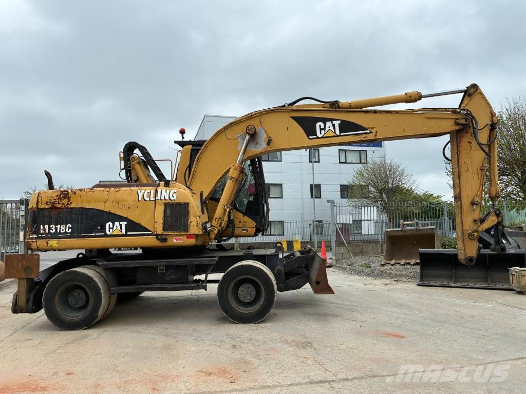 CAT M 318 C Εκσκαφείς με τροχούς - λάστιχα