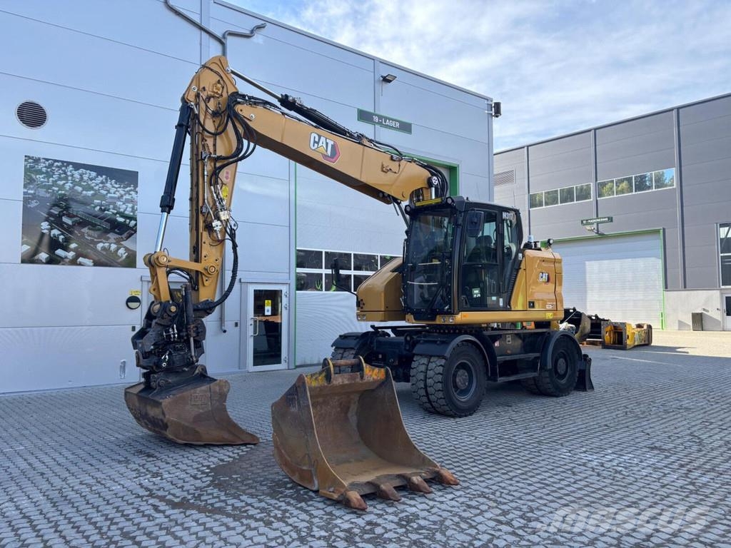 CAT M317 Escavatori gommati