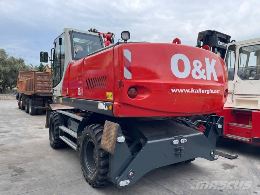 O&K MH 6.6 حفارات بعجل