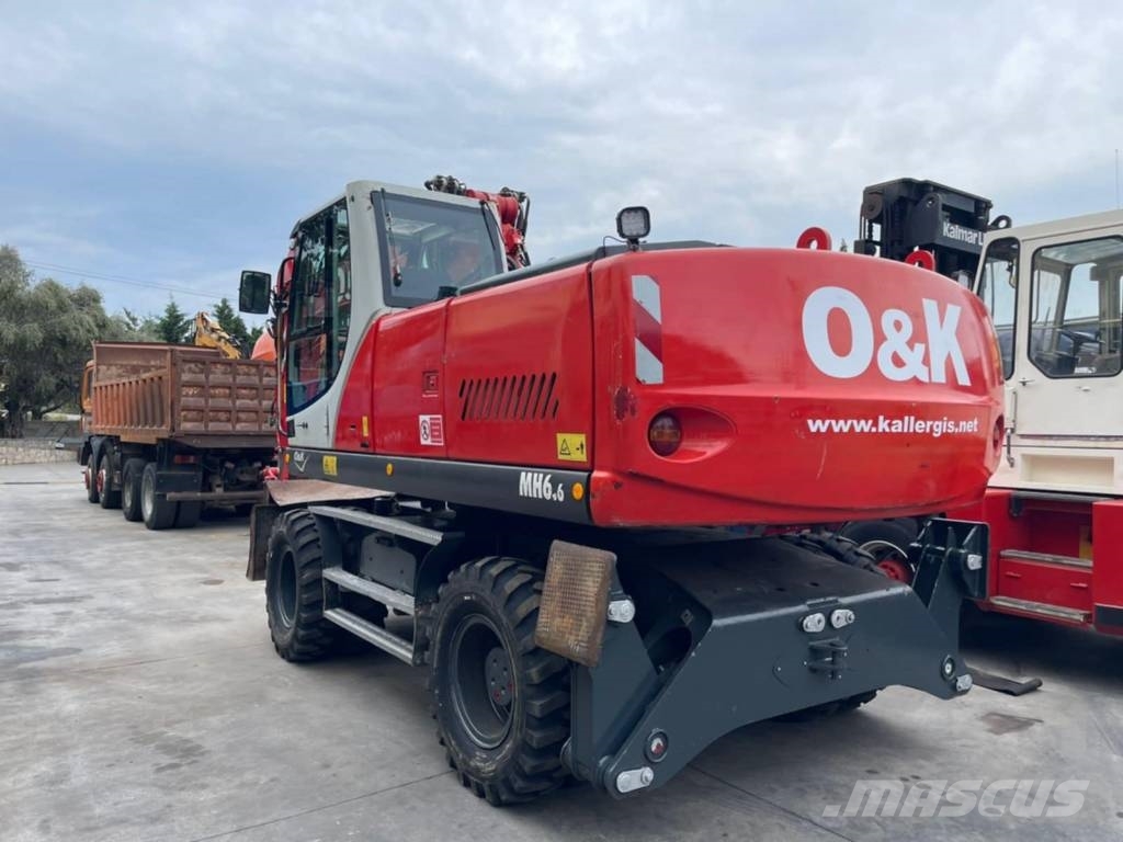 O&K MH 6.6 حفارات بعجل