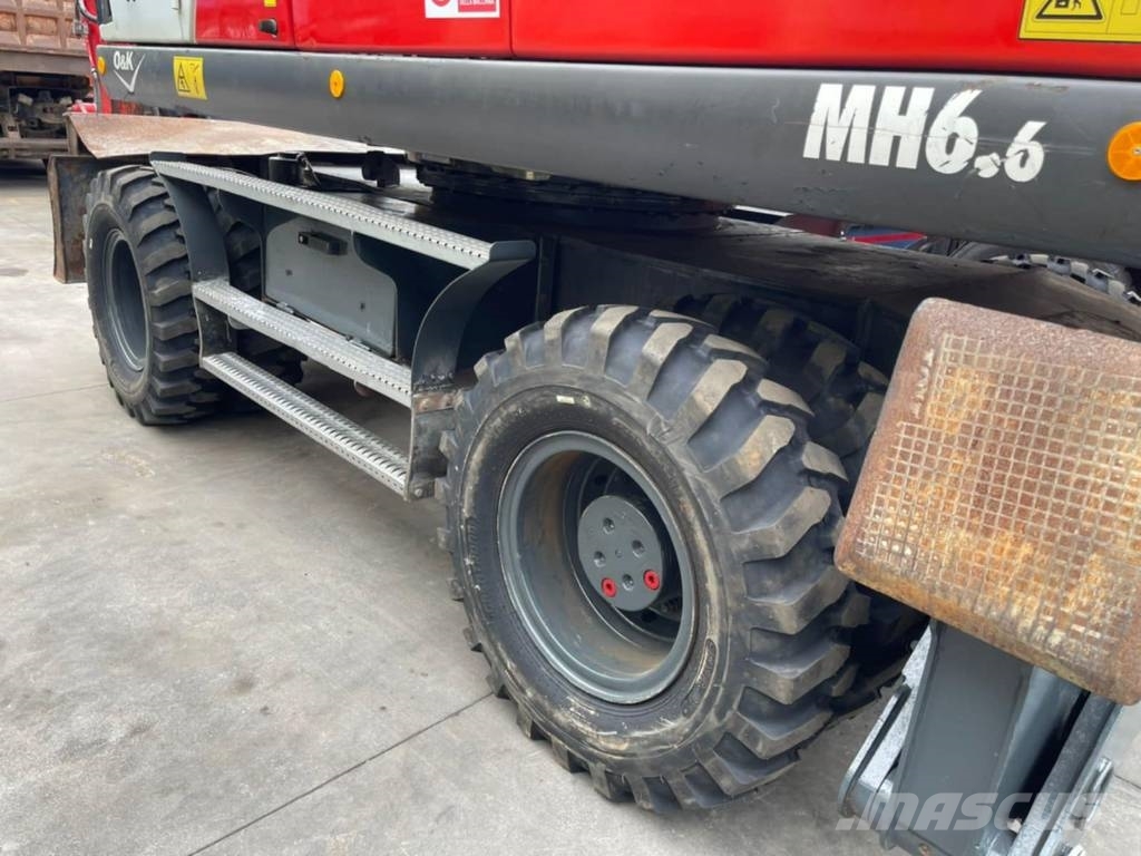 O&K MH 6.6 حفارات بعجل