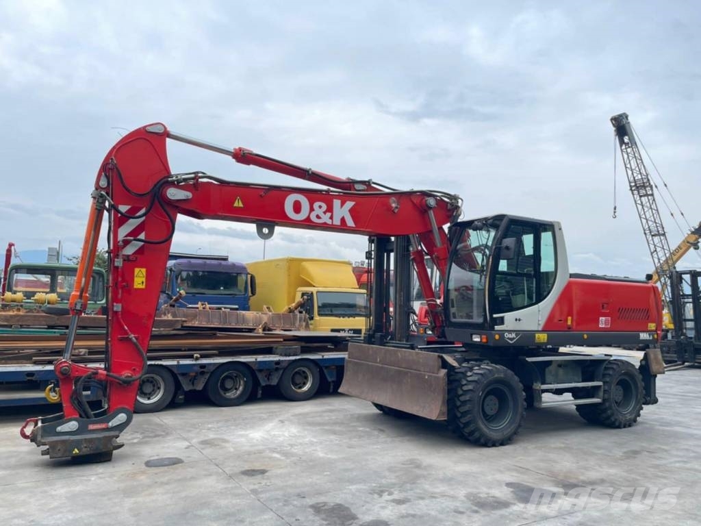 O&K MH 6.6 حفارات بعجل