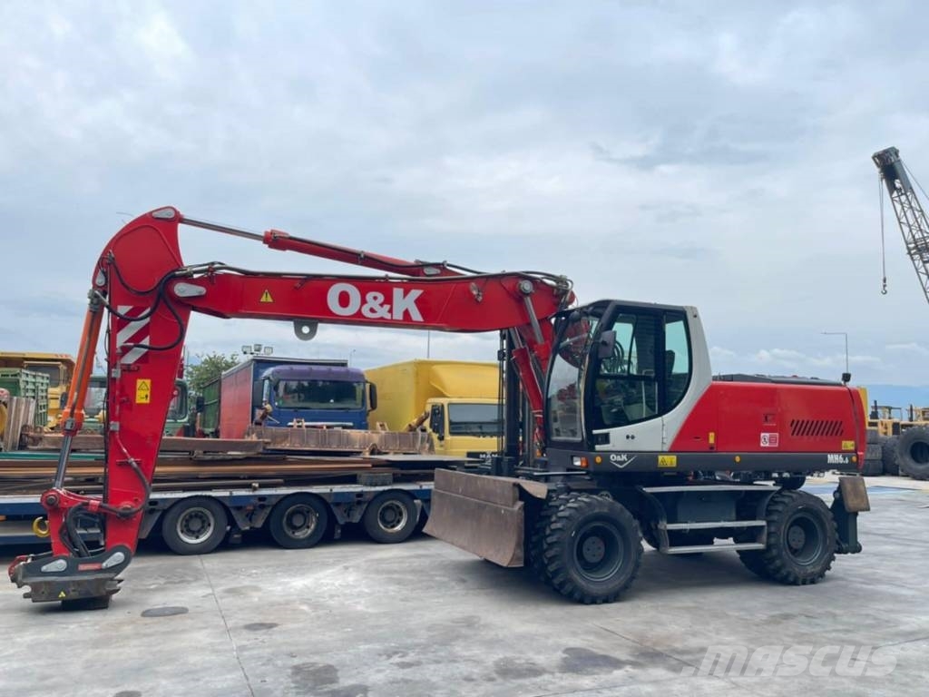 O&K MH 6.6 حفارات بعجل