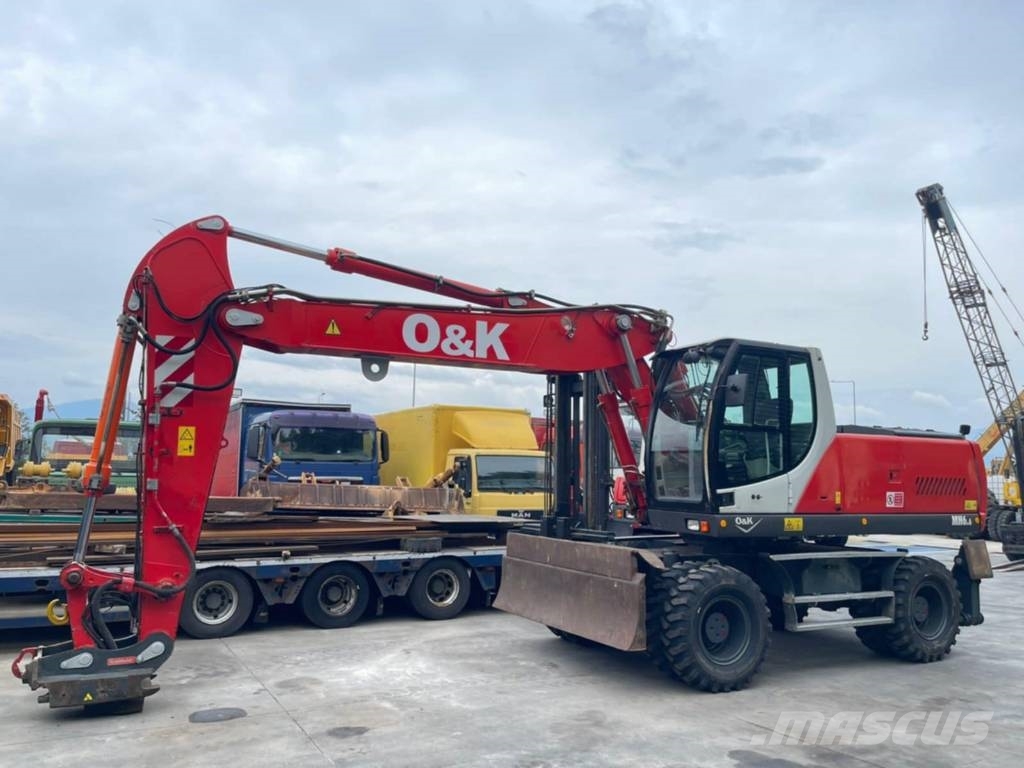 O&K MH 6.6 حفارات بعجل