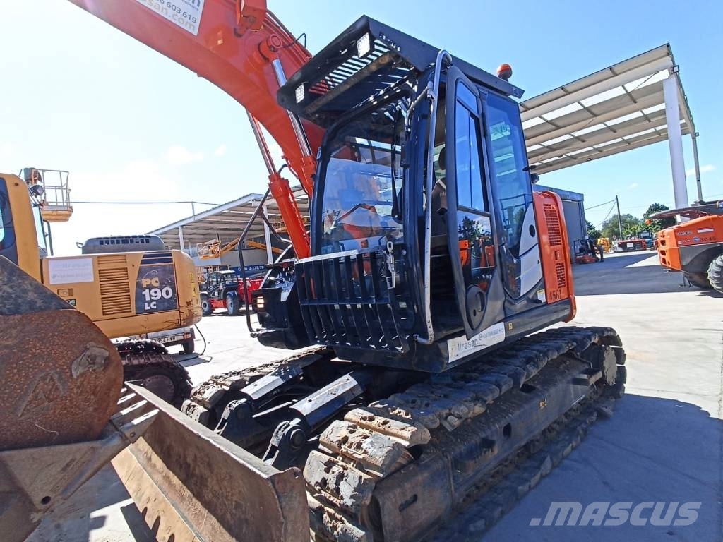Hitachi ZX 135 US-6 حفارات زحافة