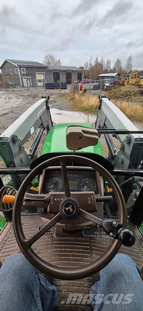 John Deere 5720 الجرارات