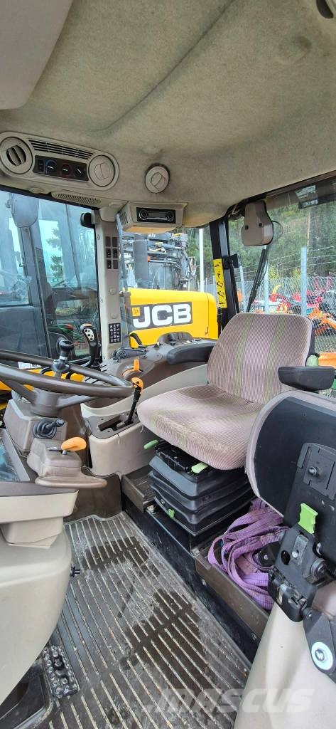 John Deere 5720 الجرارات
