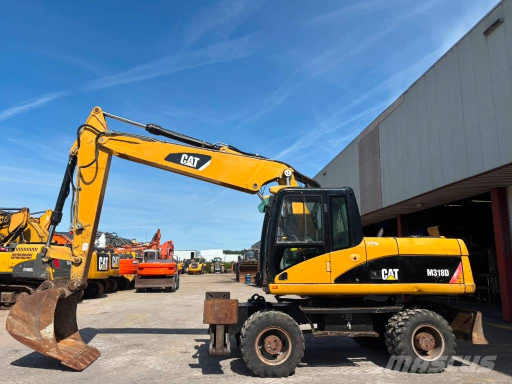 CAT M 318 D Mobilbagger