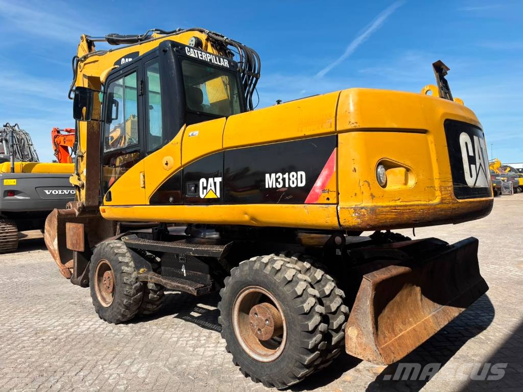 CAT M 318 D Mobilbagger