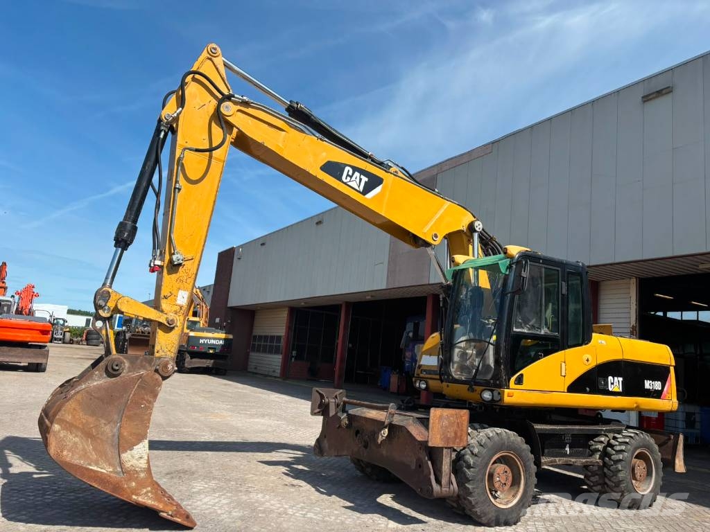 CAT M 318 D Mobilbagger