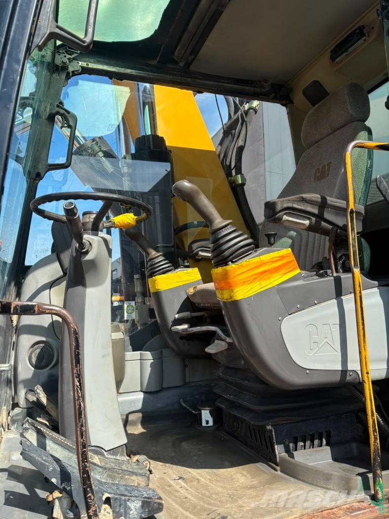 CAT M 318 D Mobilbagger