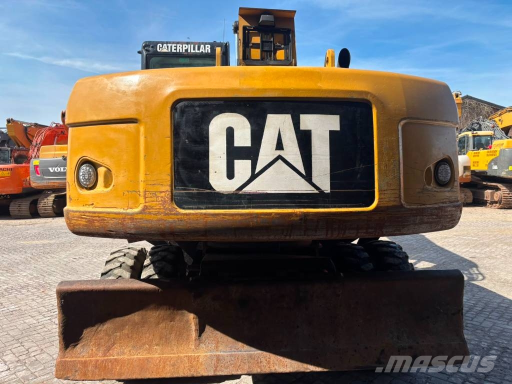 CAT M 318 D Mobilbagger