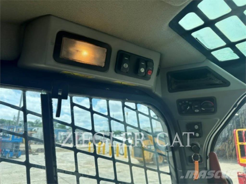 CAT 239D Rupsladers