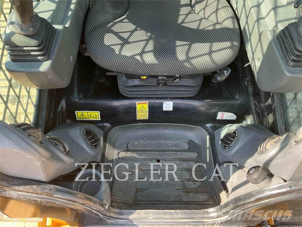 CAT 259D3 Гусеничные фронтальные погрузчики