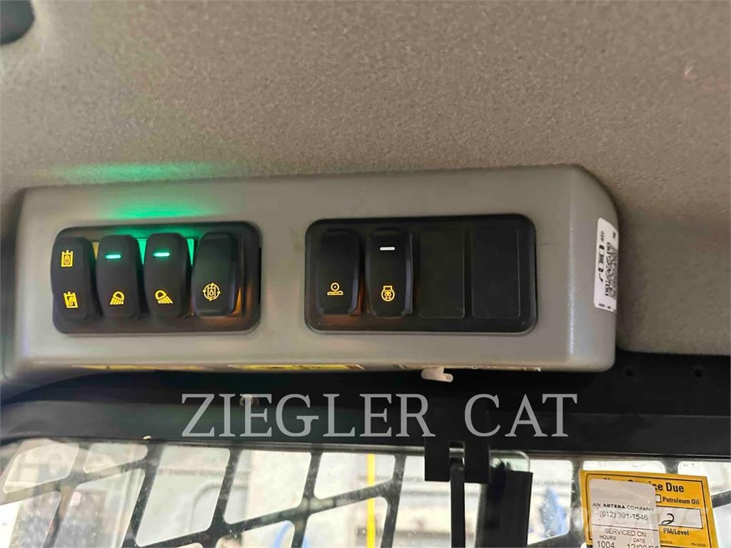 CAT 299D3XE Rupsladers