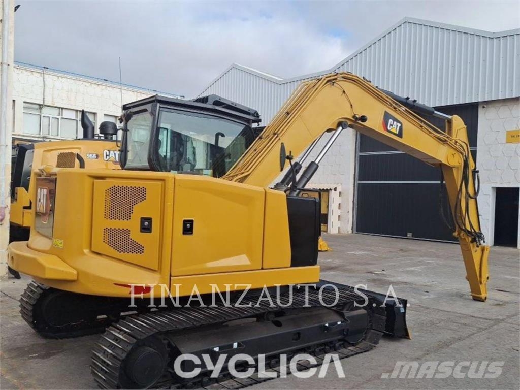 CAT 310 Rupsgraafmachines