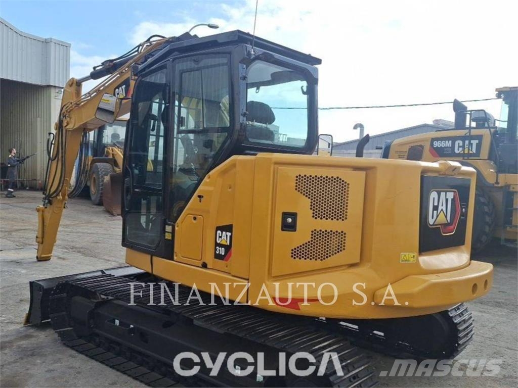 CAT 310 Rupsgraafmachines