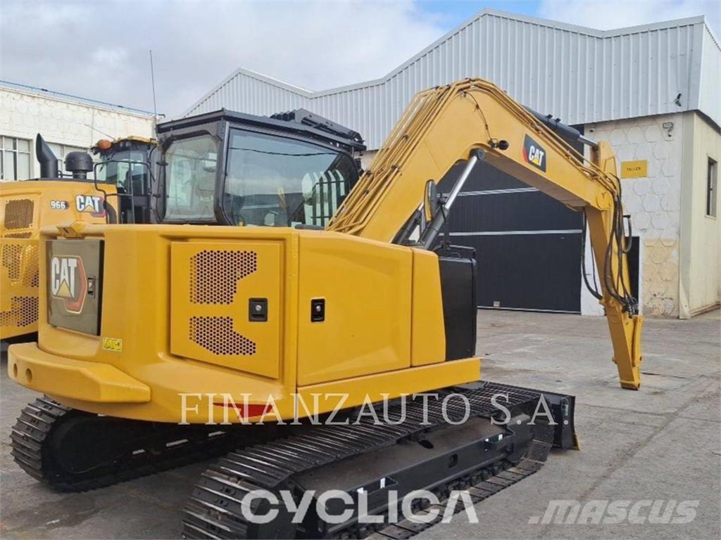 CAT 310 Rupsgraafmachines