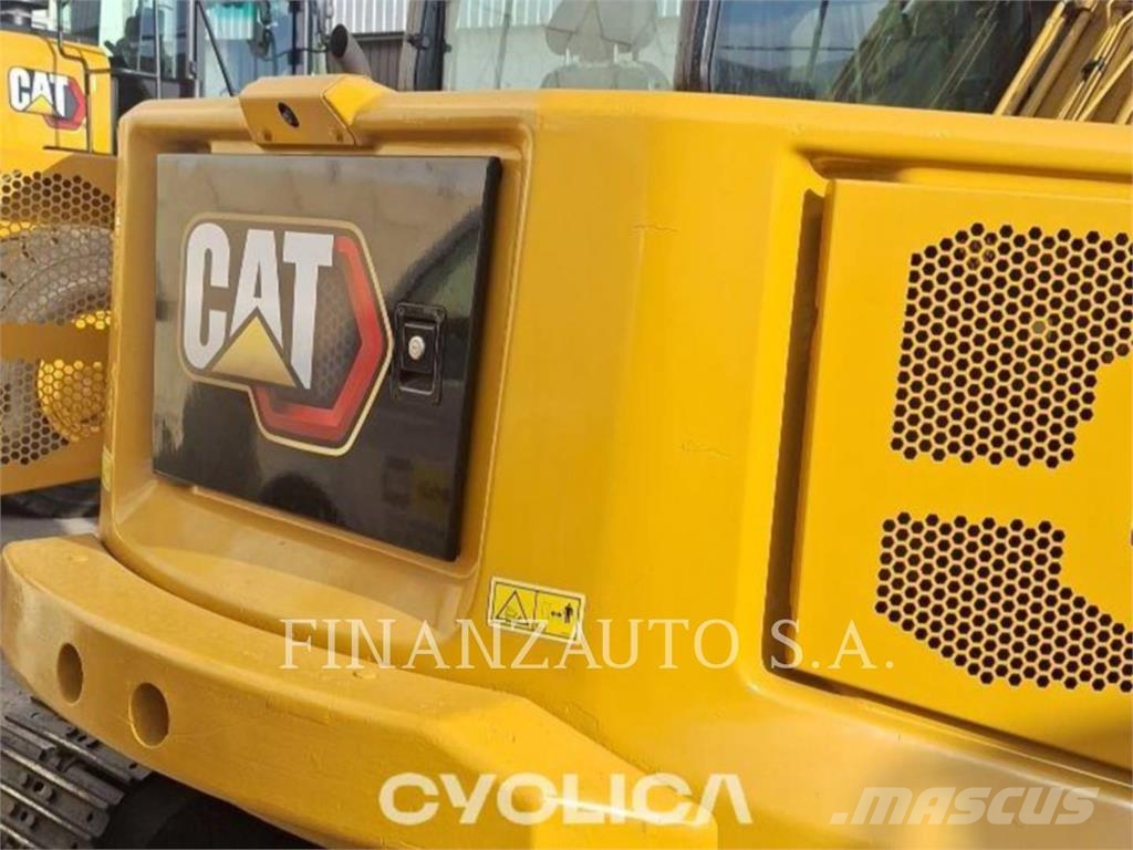 CAT 310 Rupsgraafmachines
