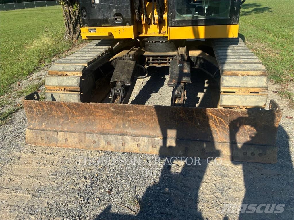 CAT 310 Minigravemaskiner