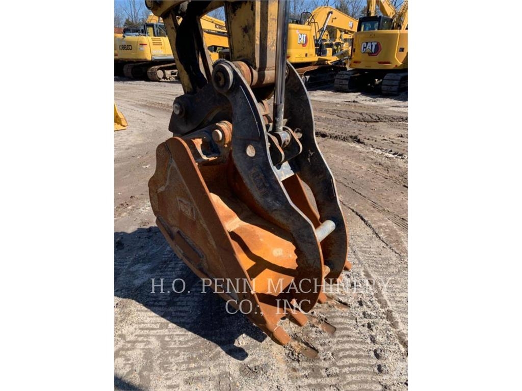 CAT 310-07 Гусеничні екскаватори
