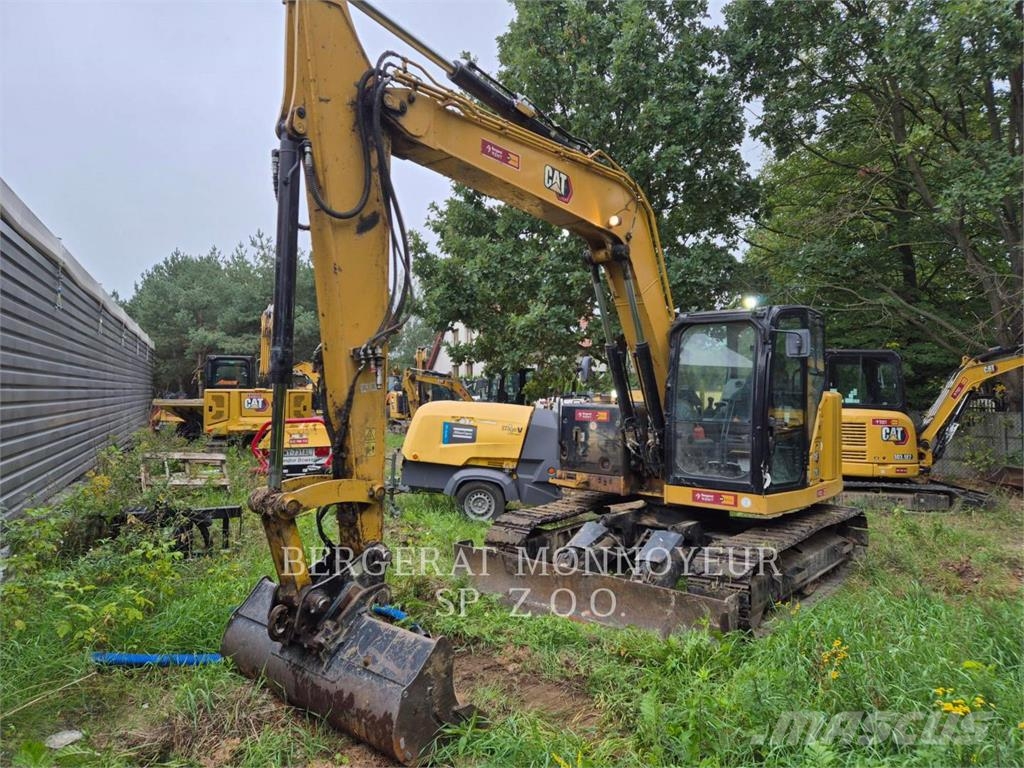 CAT 310-07 Pelle sur chenilles
