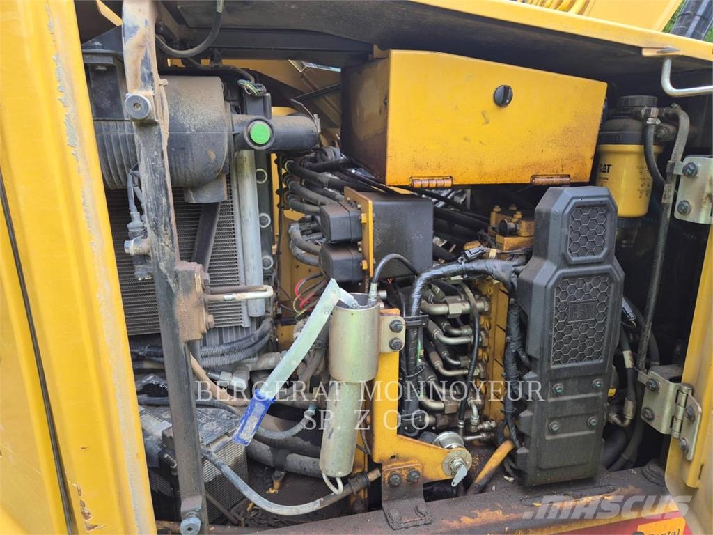 CAT 310-07 Pelle sur chenilles