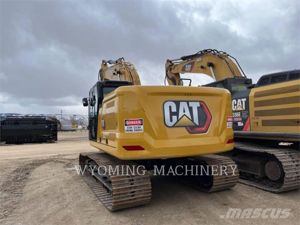 CAT 323 Rupsgraafmachines