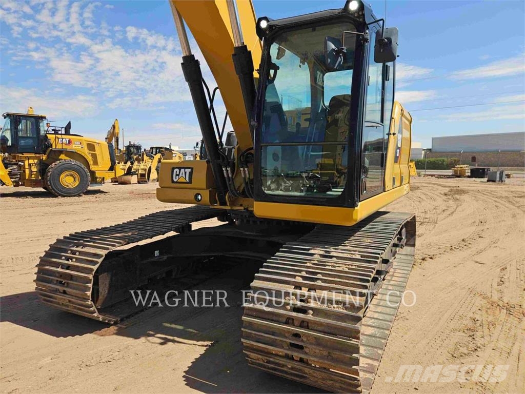 CAT 323 Bandgrävare