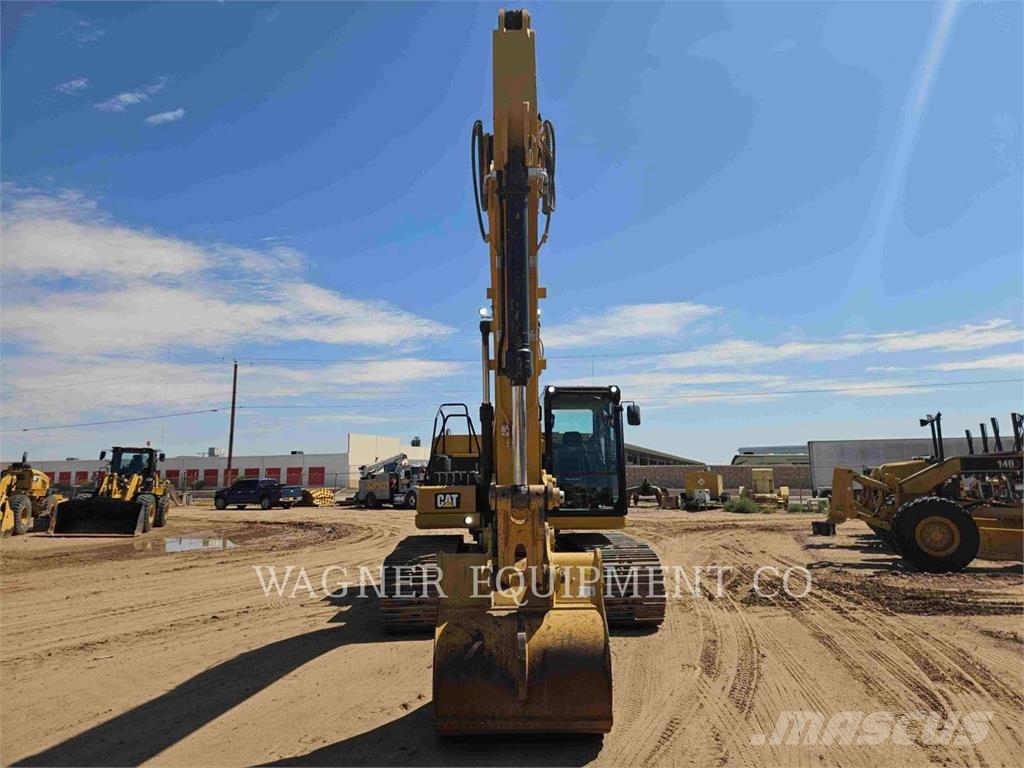 CAT 323 Bandgrävare