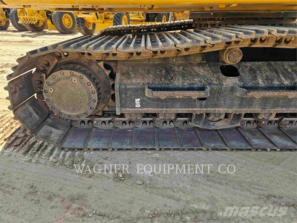 CAT 323 Bandgrävare