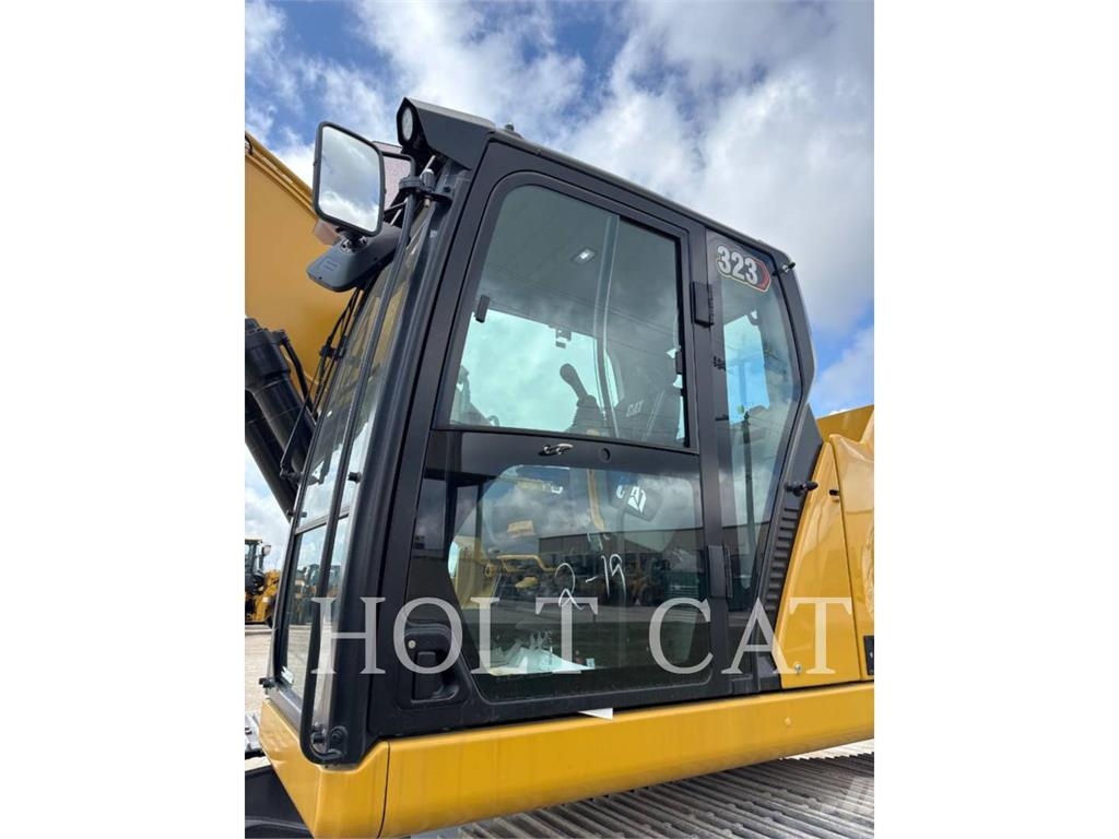 CAT 323 TC Kolesni nakladalci