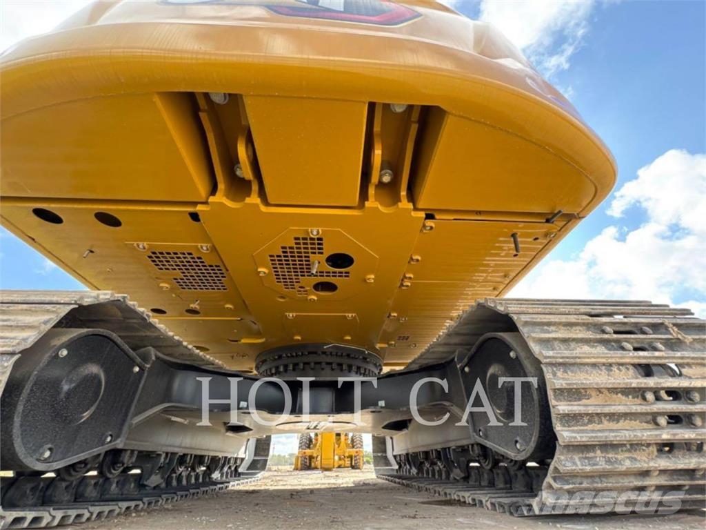 CAT 323 TC Kolesni nakladalci