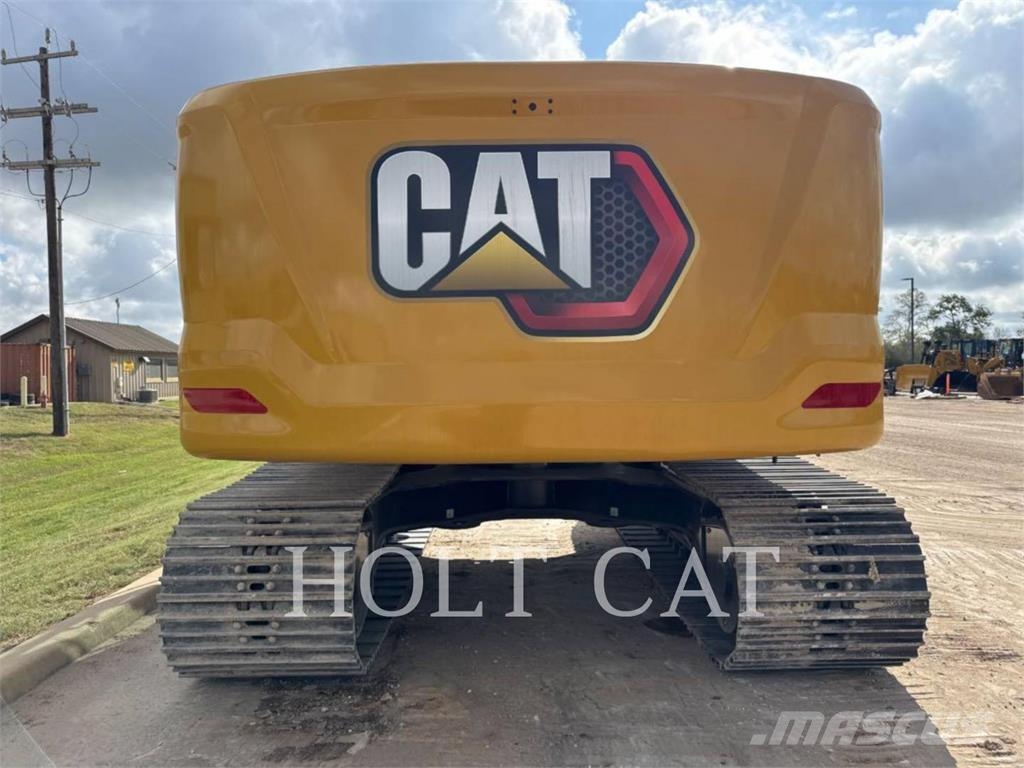 CAT 323 TC Kolesni nakladalci