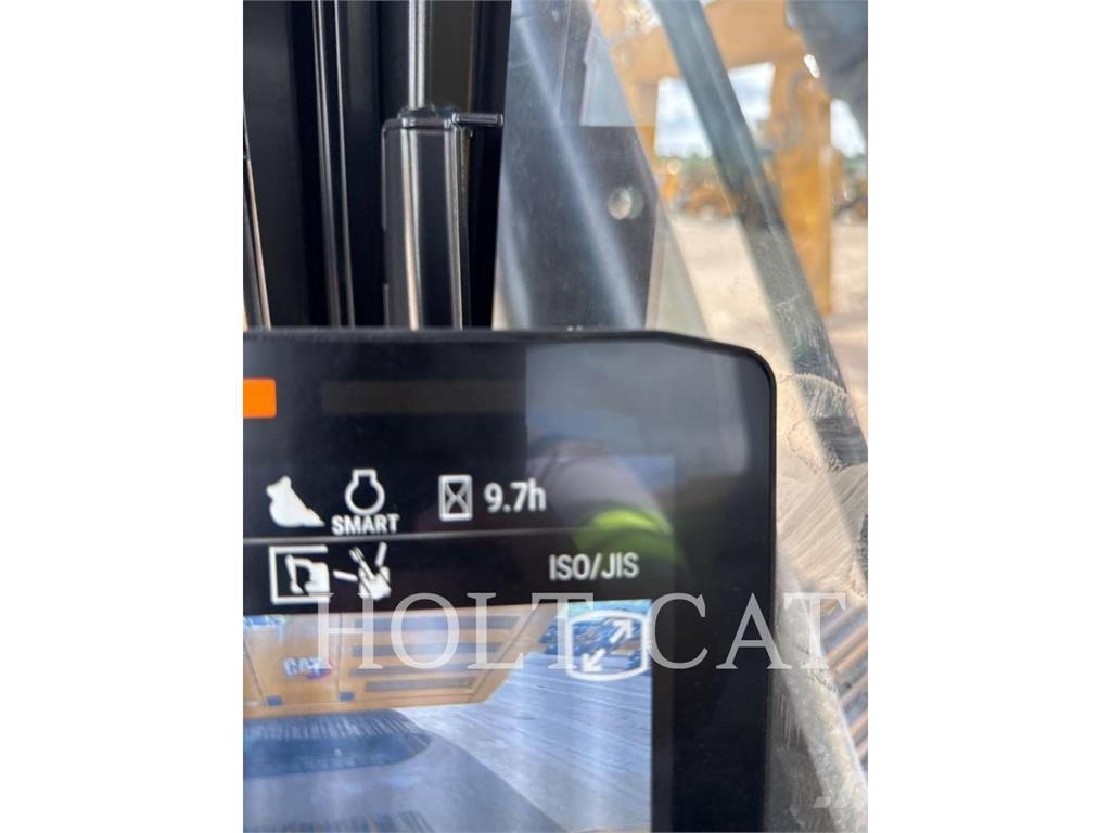 CAT 323 TC Kolesni nakladalci