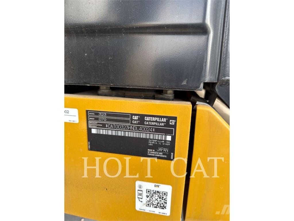 CAT 323 TC Kolesni nakladalci