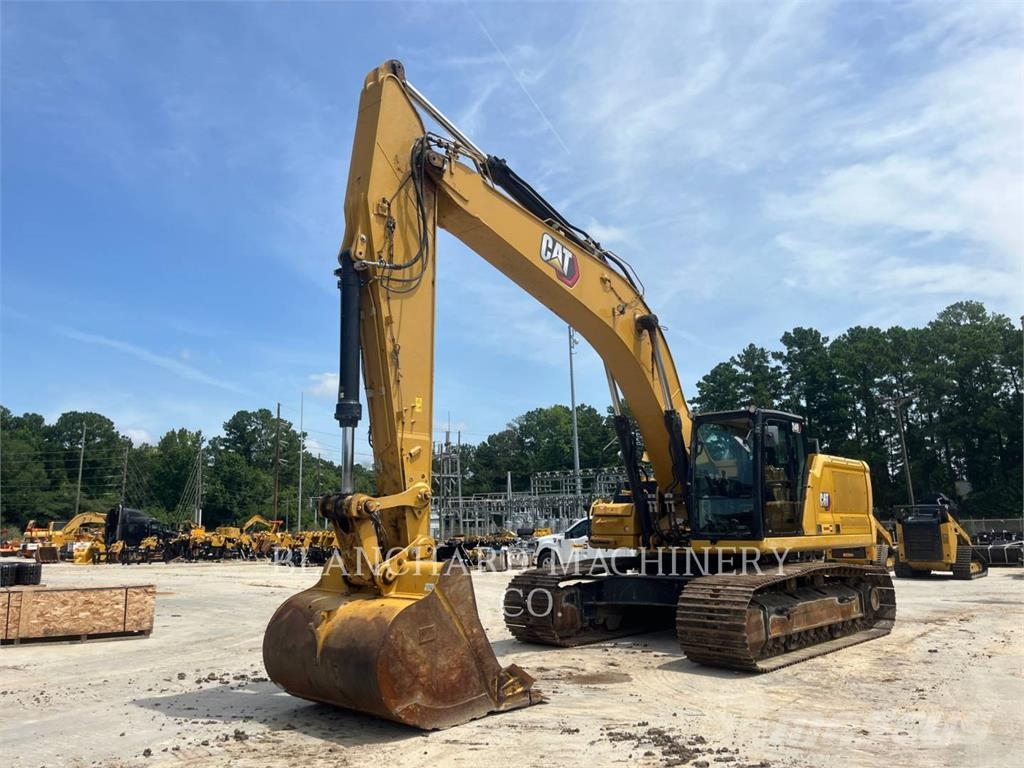 CAT 340 Гусеничні екскаватори