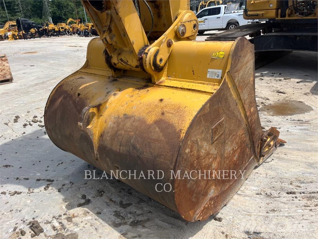 CAT 340 Гусеничні екскаватори