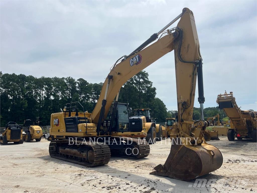 CAT 340 Гусеничні екскаватори
